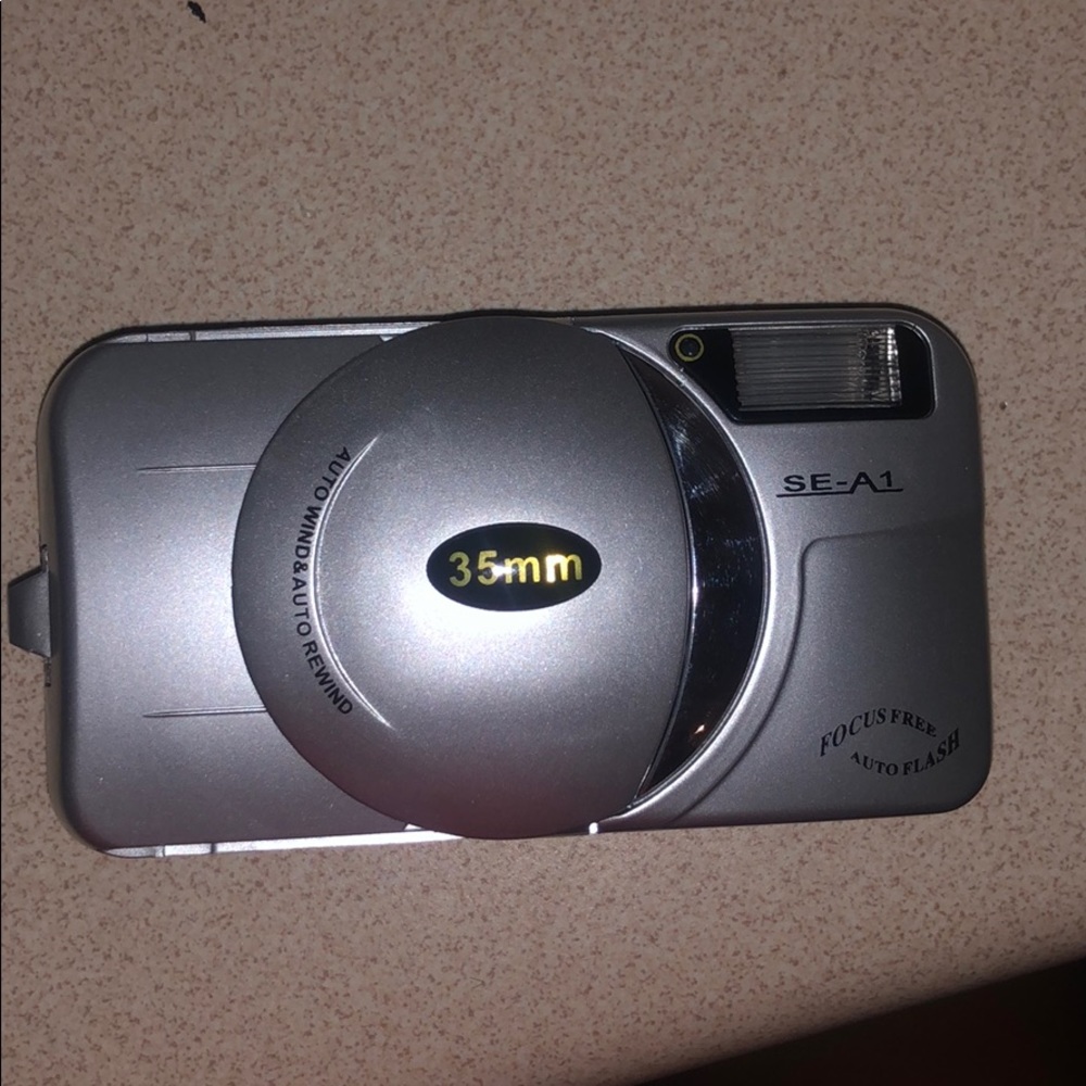 35 mm camera with built flash